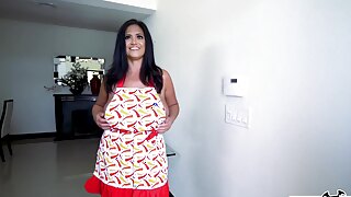 Busty Kailani Kai takes on two big cocks, eagerly earning a creamy facial.